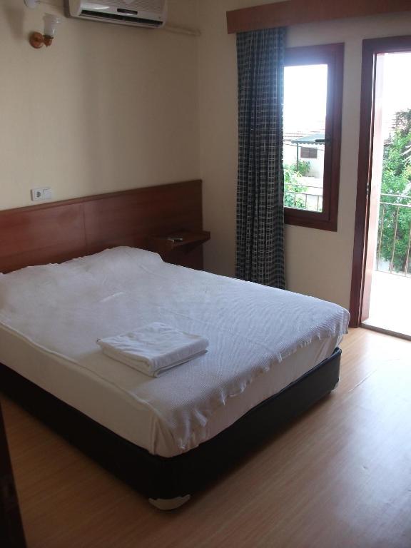 Tug Hotel Кушадаси Номер фото