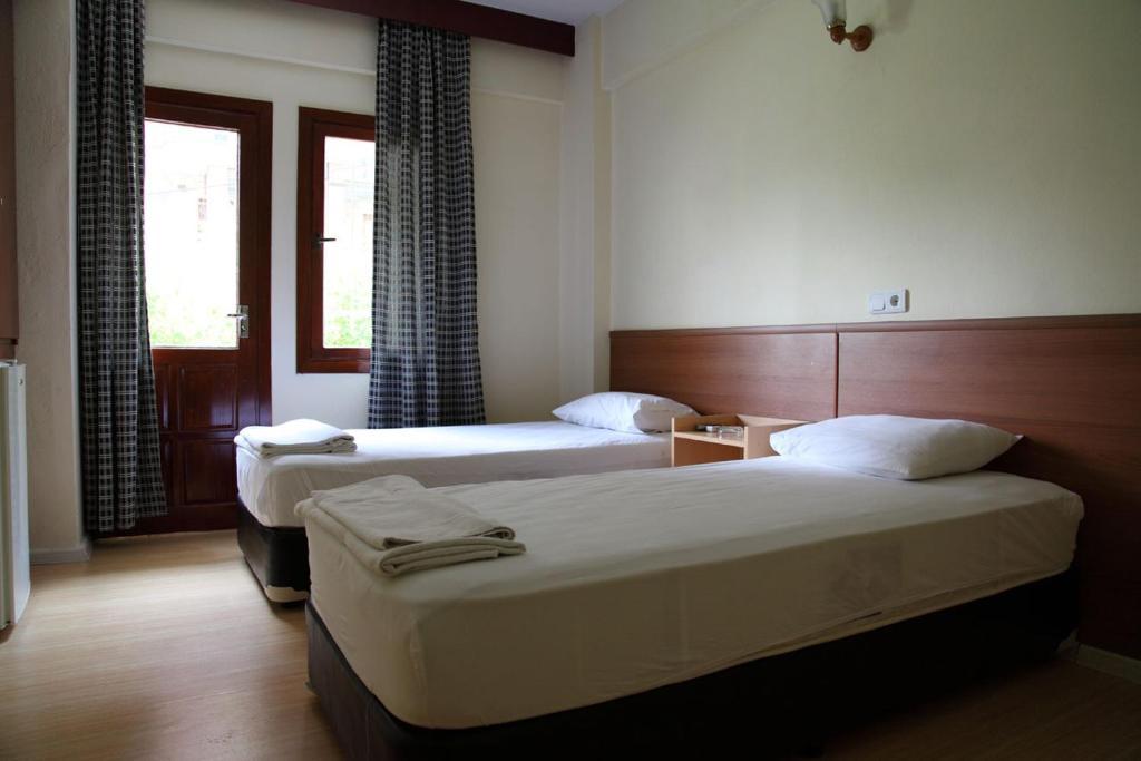 Tug Hotel Кушадаси Номер фото